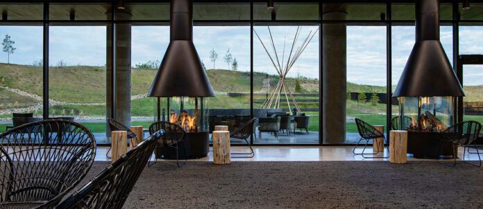 Dakota Dunes Resort lobby with indoor fireplaces in background